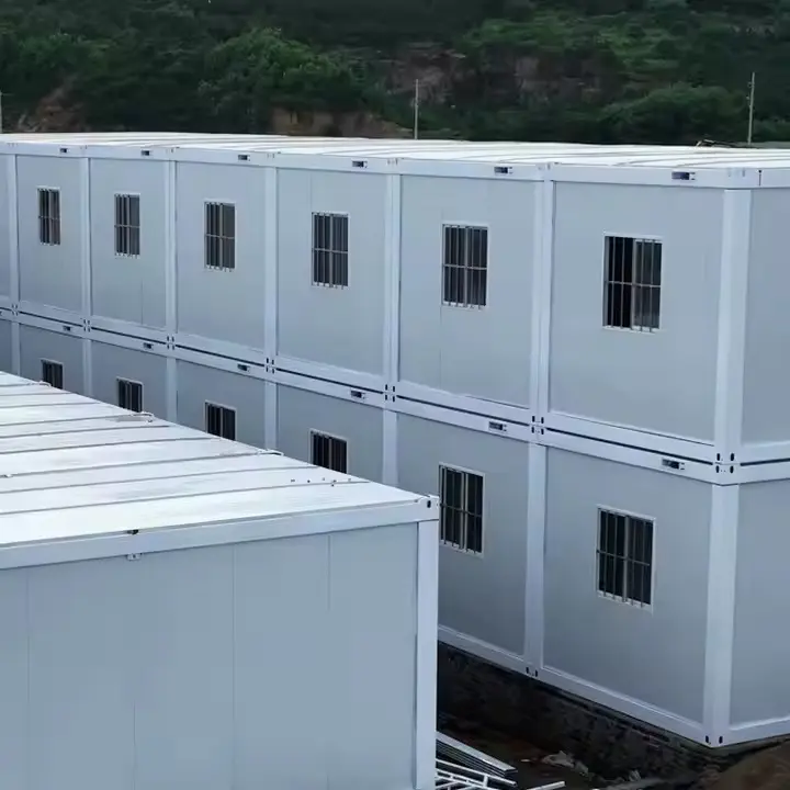 Apakah kelebihan yang ditawarkan oleh rumah kontena pek rata yang baharu, boleh guna semula dan tahan lama?